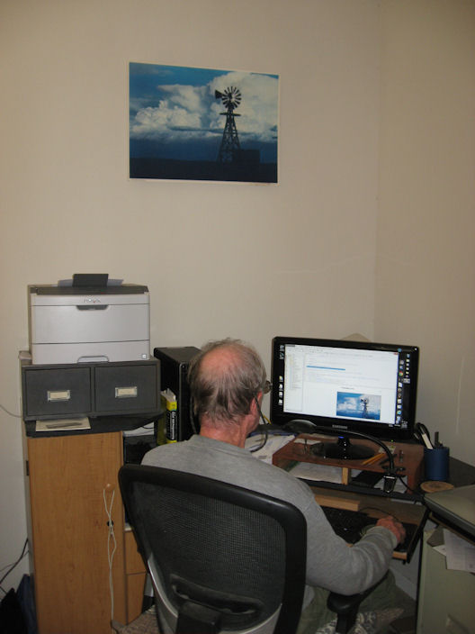 sam in his room at computer